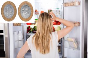 Rear View Of Woman Looking In Fridge