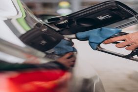 Car refueling at fuel station
