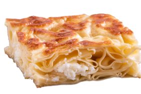 Turkish Su Boregi / Tabla borek or burek, Turkish patty; pastry tray isolated white background