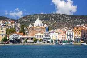 View of Mytilene seaside port with cathedral of Agios Therapontas, Lesvos island, Greece on August 7, 2022
